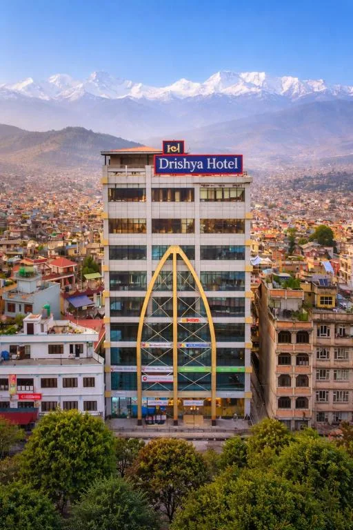 Drishya Hotel and Rooftop Restaurant 3